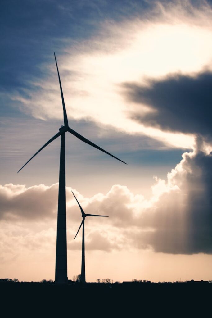 pexels-photo-735468 Silhouette Photo of Two Wind Mills during Golden Hour
